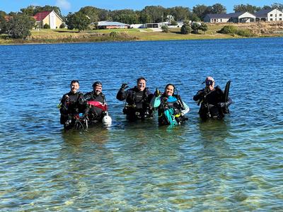 Divers at Lake Verona by Donaldson Park waving